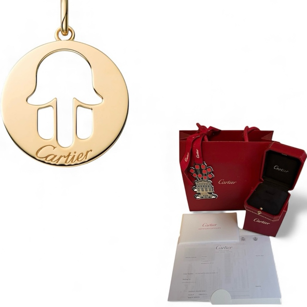 CARTIER Hamsa Fatma’s Hand Symbol Pendant in 18K yellow gold. Sold Out online.